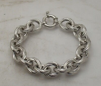 Pulsera de eslabones ovalados retorcidos cierre de anillo de resorte antideslustre plata de ley real Foto 1 de 4