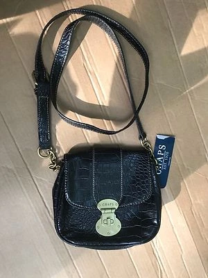 Bandolera Chaps Wristlet NEGRA  Foto 1 de 4