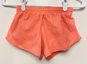 Nike Dri-Fit Mädchen XS Sport Laufshorts orangy-pink Punkte Print Shorts Tempo - Bild 1 von 4