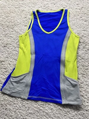 Camisa de rendimiento Sofibella sin mangas AZUL REAL Gris LIMA para mujer M Usada en Excelente Condición Foto 1 de 4