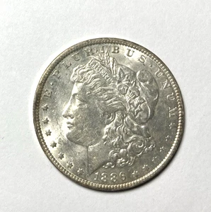 Dólar de plata Morgan 1886-O AU++ bonito original - Imagen 1 de 2