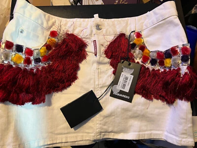 Falda DSQUARED2 blanca con flecos. La falda tiene algo de decoloración en la parte superior de la falda. Foto 1 de 4