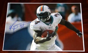 MIAMI DOLPHINS RICKY WILLIAMS SIGNED 12X18 PHOTO NFL!!!! - Picture 1 of 1