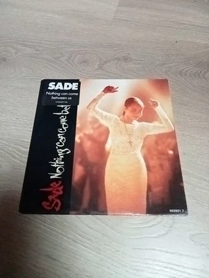 45 TOURS 7" SADE NOTHING CAN COME BETWEEN US 1988 HOLLAND STICKER - Photo 1/4