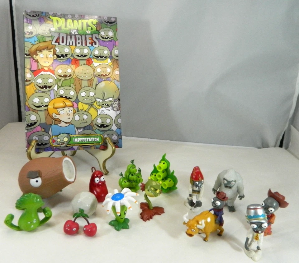 Lote de 13 figuras de juguete de PVC Plants Vs Zombies con libro de bolsillo de estación de vacunación Foto 1 de 4