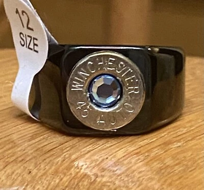 Anillo Winchester calibre 45 carcasa bala níquel negro talla 12 con cristal azul Foto 1 de 4