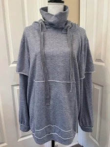 Umgee M hellblau Oversized Hoodie Stufenärmel distressed roher Saum Rollkragen - Bild 1 von 12