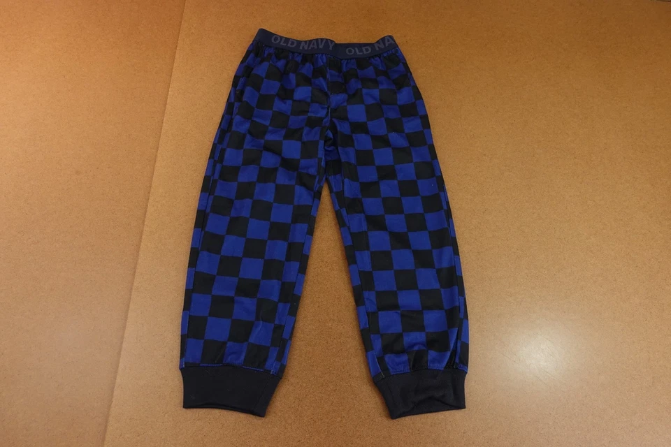 Pantalones jogger de pijama tejido jersey a cuadros azul negro pequeño (6/7) azul marino antiguo para niños nuevos con etiquetas Foto 1 de 4