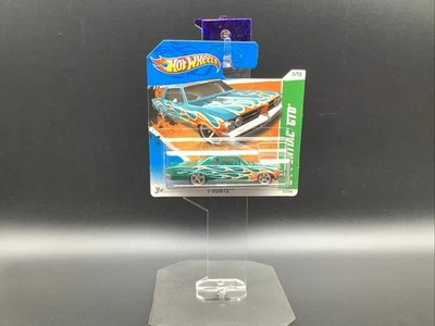 2011 Hot Wheels '64 PONTIAC GTO TEAL #57 CACCIA AL TESORO 7 REDLINE RR CARTA CORTA - Immagine 1 di 4