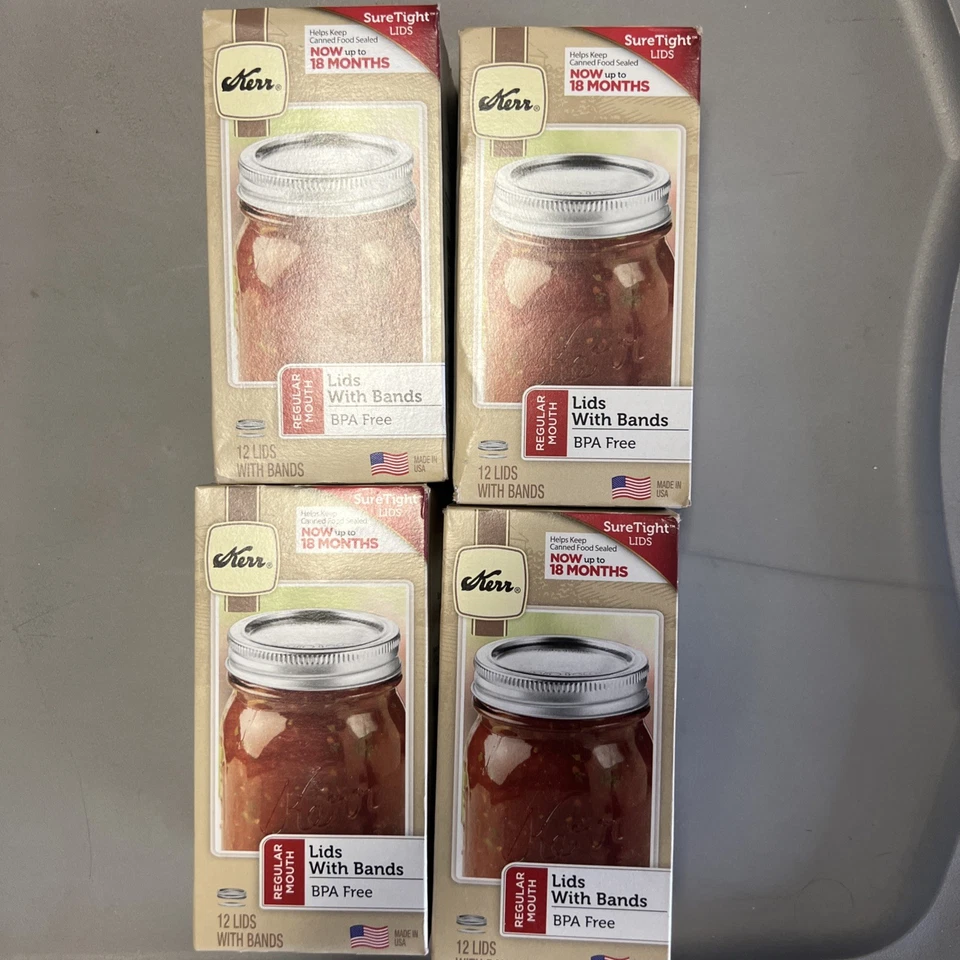 Tapa de tarro de enlatado bucal regular de 4 kerr con bandas - Caja de 12, 48 tapas y bandas Foto 1 de 1