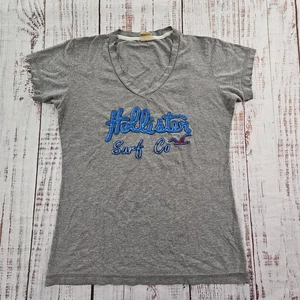 Camiseta para mujer Hollister Surf Co gris manga corta cuello en V L - Imagen 1 de 7