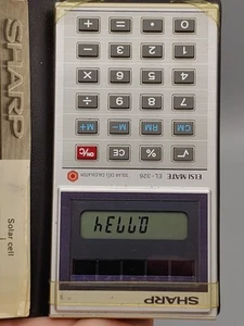 Calculadora de células solares Sharp Elsi-Mate EL-326S de colección con manual y estuche como nueva - Imagen 1 de 13