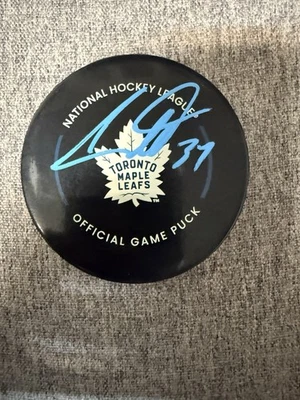AUSTON MATTHEWS Signed Autographed Maple Leafs NHL Game Puck FANATICS   - Image 1 of 3
