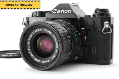 [Exc+5] Canon AE-1 Program schwarz neues FD NFD Objektiv 35–70 mm f/3,5–4,5 aus Japan - Bild 1 von 4