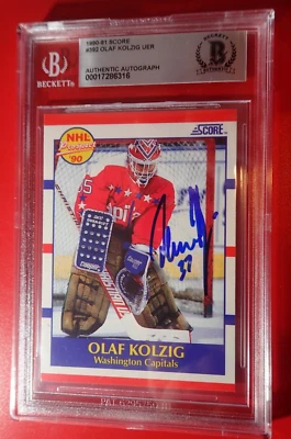 Olaf Kolzig 1990-91 Puntuación Beckett Losa Firmado Novato Auténtico Automático Foto 1 de 2