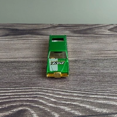 Hot Wheels 1990 Taxi Limozeen a cuadros oro verde ~ llantas hoja de sierra Foto 1 de 4