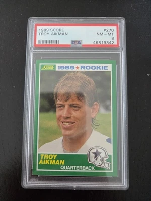 Puntuación 1989 - Troy Aikman #270 (RC) Dallas Cowboys novato PSA 8 NFL fútbol americano Foto 1 de 2