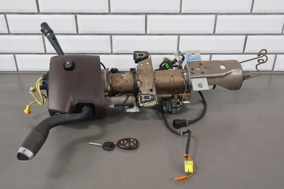 Гибридная рулевая колонка 2010-2013 GMC Yukon Denali с ключом и переключателями (Cocoa 397) - Изображение 1 из 4