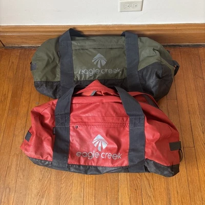 Lote de 2 bolsas de lona grandes Eagle Creek No Matter What Flashpoint rojas y verdes de dos piezas Foto 1 de 4