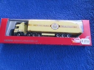 Herpa Spur H0 155878 Scania R HL Container-Sattelzug Warsteiner - Bild 1 von 2