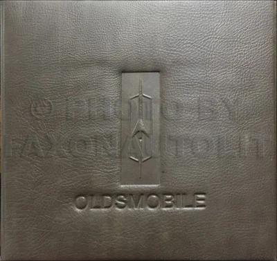 Oldsmobile 1973 color y tapicería distribuidor álbum pintura tela muestras Foto 1 de 2