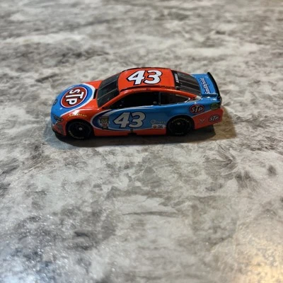 Lionel 2017 ARIC ALMIROLA STP FORD FUSION 1/64 NASCAR DIECAST - Image 1 of 4