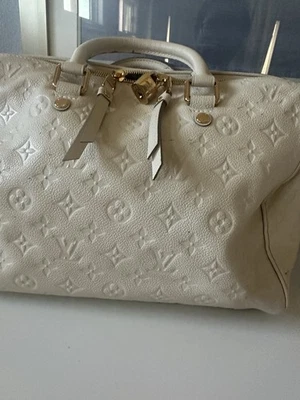 Bolso de mano Louis Vuitton Speedy 30 con monograma crema Foto 1 de 4