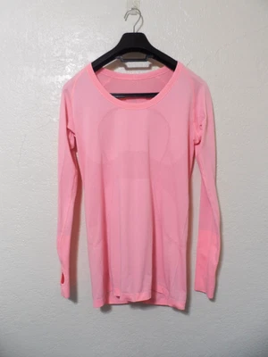Top de mujer Lululemon rosa Run Swiftly Tech manga larga 10 Foto 1 de 4