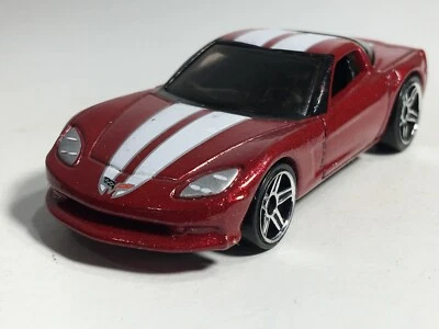 Hot Wheels Chevy C6 Corvette Metallic Rojo Blanco Raya 2007 HW Mystery Cars #4 Foto 1 de 4