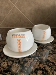 Schokolade vom Glatzkopf Max Brenner HUG MUG Tasse & Untertasse 2er Set Iris Sohar - Bild 1 von 8