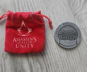 Moneta Unità Assassin's Creed con Sacchetto di Velluto Cassa di Bottino Nov 2014 ESCLUSIVA - Foto 1 di 2