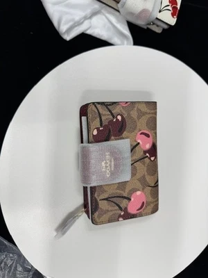 COACH Women's Medium Corner Zip Wallet Signature Canvas With Cherry Print - Image 1 of 3