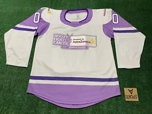 Maglia da hockey AstraZeneca taglia SR M/L lotta contro il cancro 25° anniversario - Foto 1 di 7