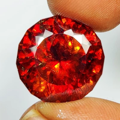 Esfalerita naranja fuego superior natural 26,60 quilates corte brillante redondo, África Foto 1 de 4