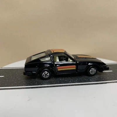 Matchbox Superfast Datsun Nissan Fairlady Z 280z listras pretas/laranja 1:64 quase perfeito - Imagem 1 de 4