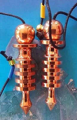 2 Copper Dowsing Pendulums,  EGYPTIAN STYLE 4 RING ISIS COPPER DOWSING PENDULUM - Image 1 of 2