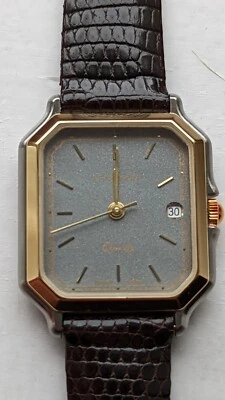 VINTAGE TECHNOS SWISS MADE QUARTZ STAINLESS STEEL SHATTERPROOF WATCH  - Image 1 of 4