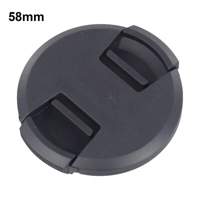 Capuchon d'objectif noir élégant améliore l'apparence de votre appareil photo