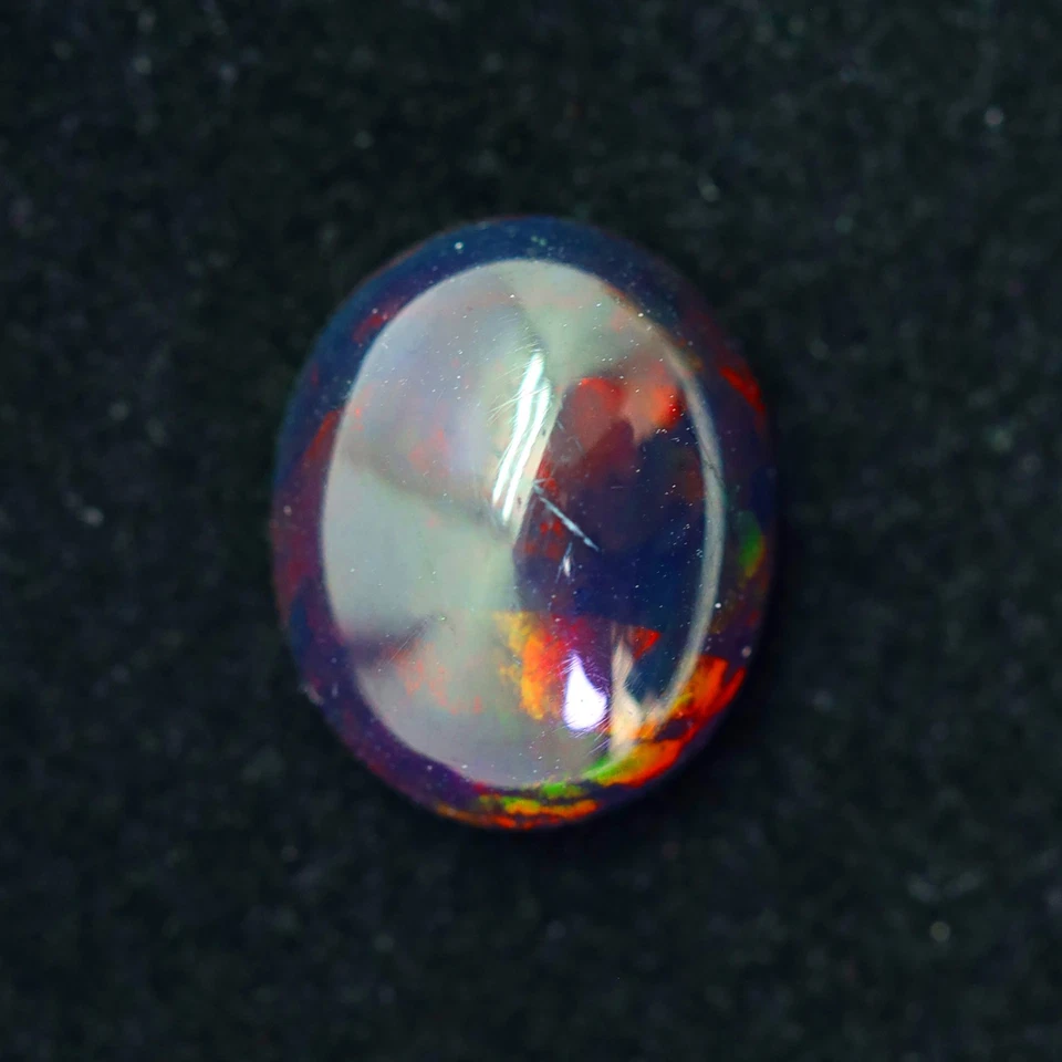 Brillos multicolores de 2,52 quilates en mezcla 3D patrón de arlequín Etiopía Welo ópalo negro Foto 1 de 1