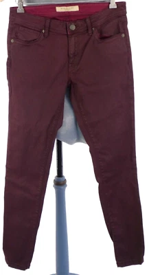 Pantalones de mezclilla Burberry Brit ajustados tiro bajo rojos recubiertos de sangre de buey calce ajustado W 30 diseñador Foto 1 de 4