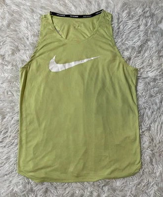 Camiseta sin mangas Nike Dri FIT para correr atletismo amarilla camiseta de entrenamiento atlética para mujer M Foto 1 de 4
