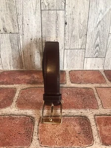Ceinture femme Yves Saint Laurent 34" marron logo embossé boucle laiton accents - Photo 1/9