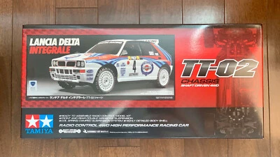 TAMIYA 58570 1/10 R/C LANCIA DELTA INTEGRALE (TT-02 Chassis) Nuovo con scatola - Immagine 1 di 4