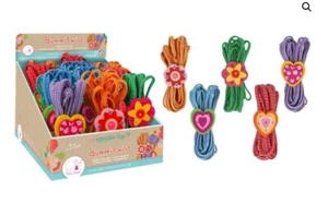 Gummitwist mit Holzornament - Bild 1 von 1