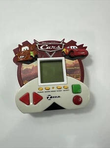 Disney Pixar Cars Handheld Portable Electronic 5 in 1 Game Zizzle Working 2007 - Picture 1 of 5