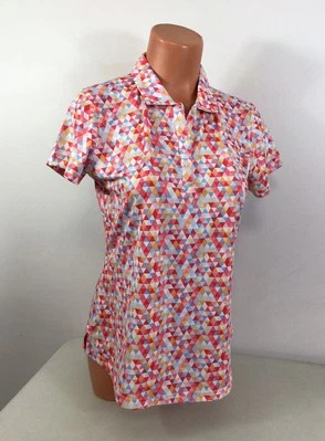 Camiseta polo pequeña Pebble Beach Performance para mujer Foto 1 de 4