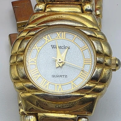 Westclox relógio feminino tom dourado mostrador branco algarismos romanos pulseira dobrável vintage. - Imagem 1 de 4