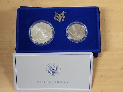 1886-1986 United States Mint Liberty Coins Set Of 2 Silver & Half Dollar UNC SET - Image 1 of 4