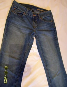 Pantalones de mezclilla para mujer Gap premium de altura baja corte de bota lavado medio. Talla 6. 28 x 29 - Imagen 1 de 7