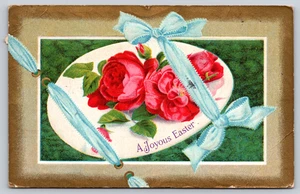 Postcard A Joyous Easter Red Roses Blue Bows Gilt Edges Embossed - Picture 1 of 3